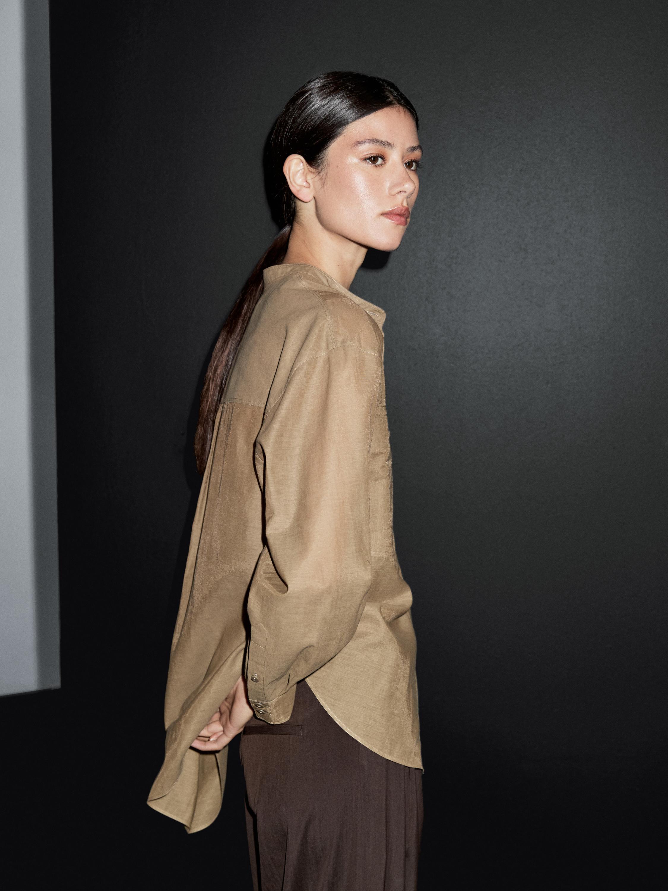 Long shirt with stand collar